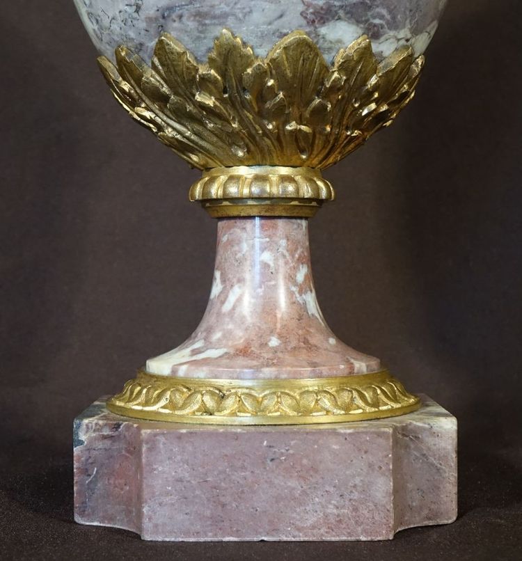 Pair Of Marble Covered Vases