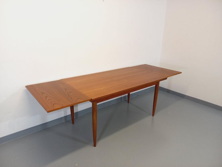 Vintage Scandinavian style teak dining table from the 1950s/60s with extensions