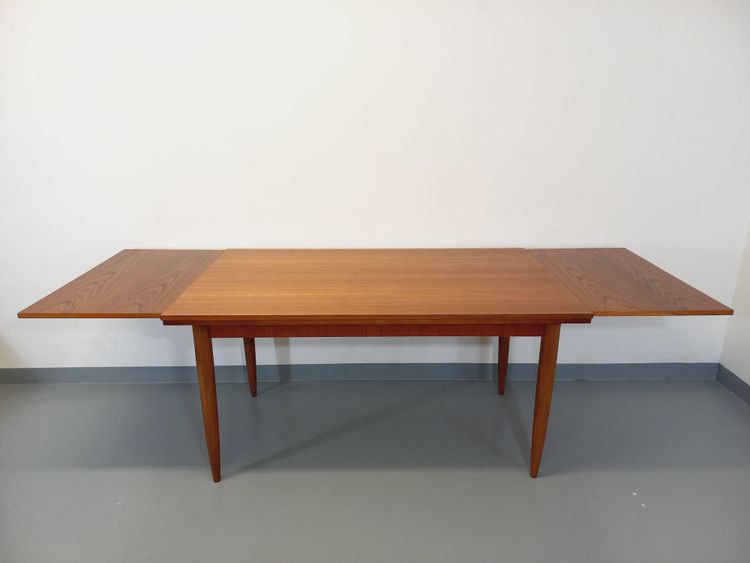 Vintage Scandinavian style teak dining table from the 1950s/60s with extensions
