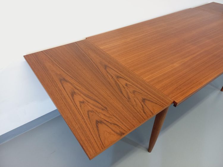 Vintage Scandinavian style teak dining table from the 1950s/60s with extensions