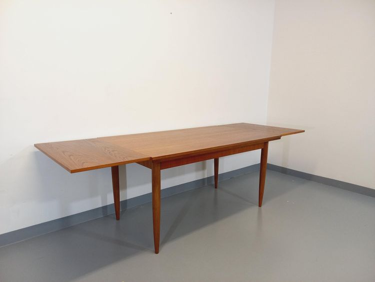 Vintage Scandinavian style teak dining table from the 1950s/60s with extensions