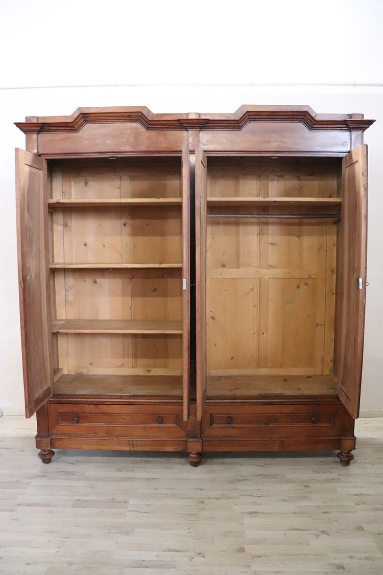 Large antique wardrobe in solid walnut, Italy Mid 19th century