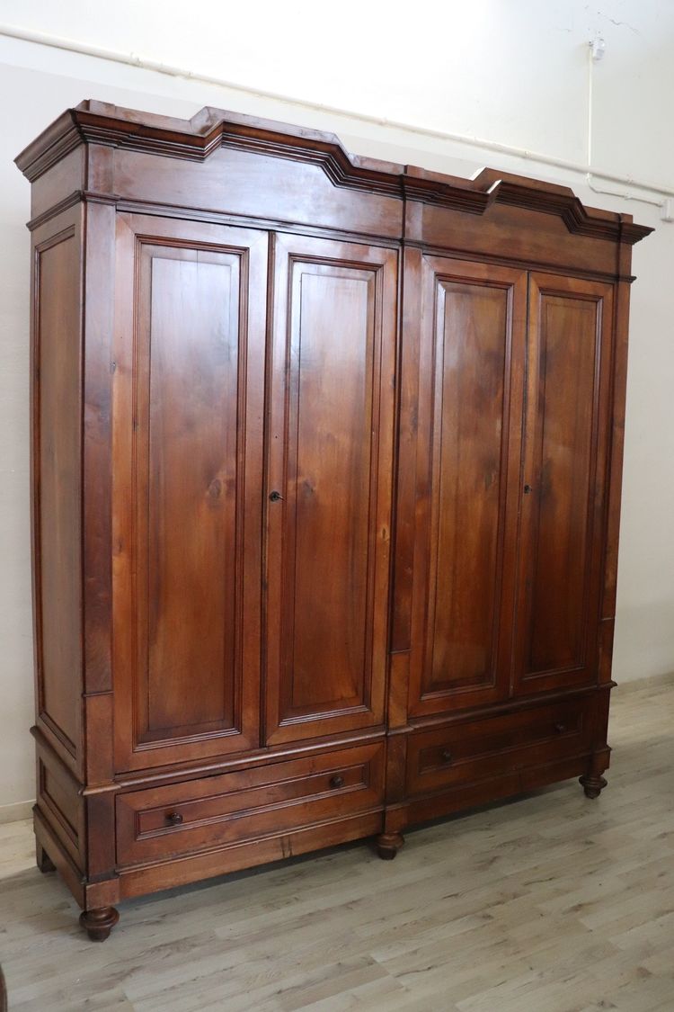 Large antique wardrobe in solid walnut, Italy Mid 19th century