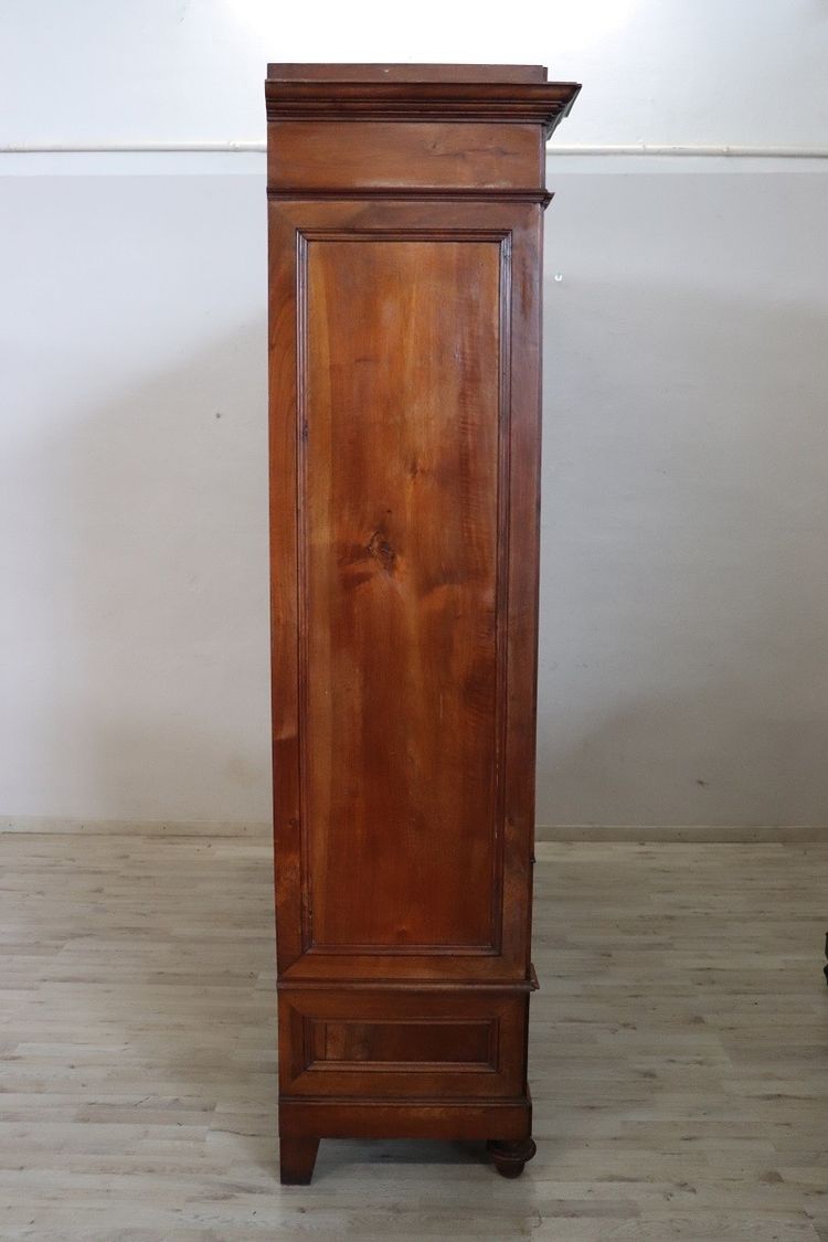 Large antique wardrobe in solid walnut, Italy Mid 19th century