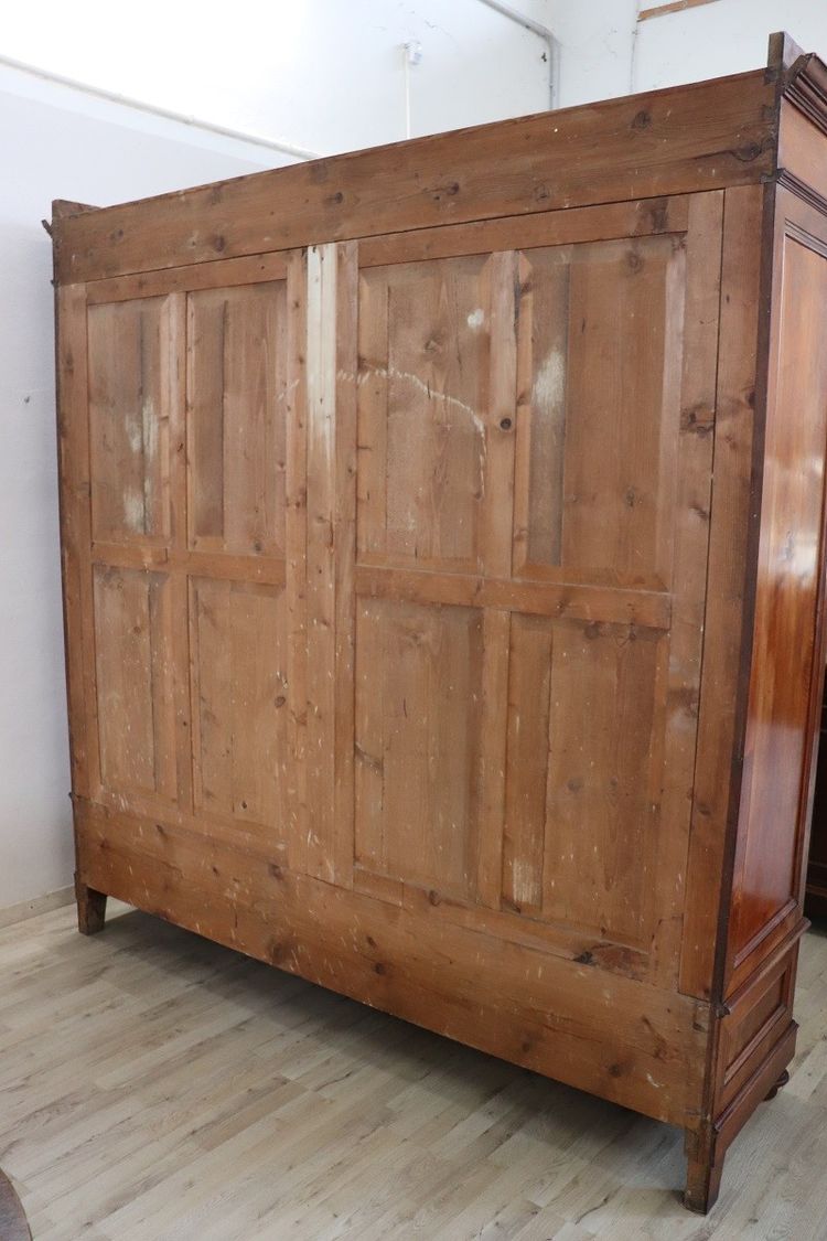 Large antique wardrobe in solid walnut, Italy Mid 19th century
