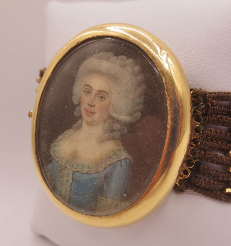 Bracciale e capelli in oro, XVIII secolo.