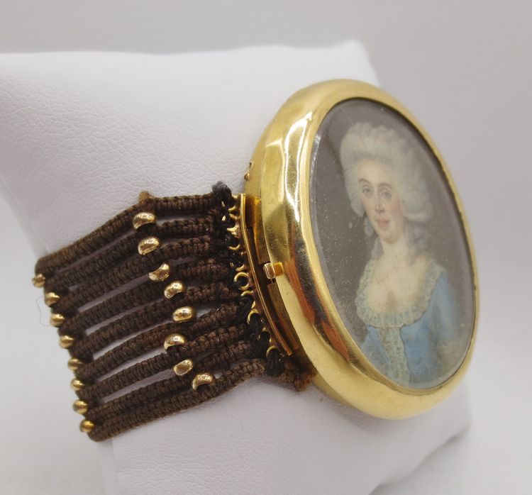 Bracciale e capelli in oro, XVIII secolo.