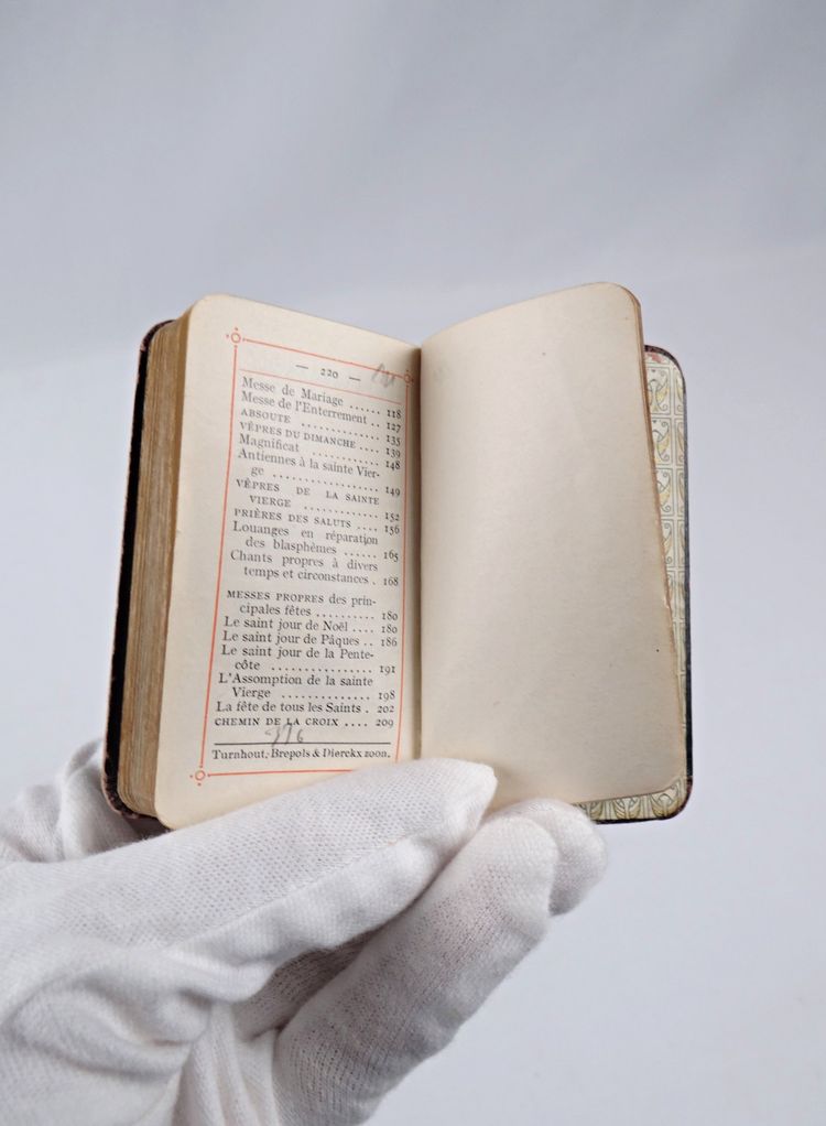 A small, pocket-sized parishioner's book, complete with offices and prayers during Holy Mass.