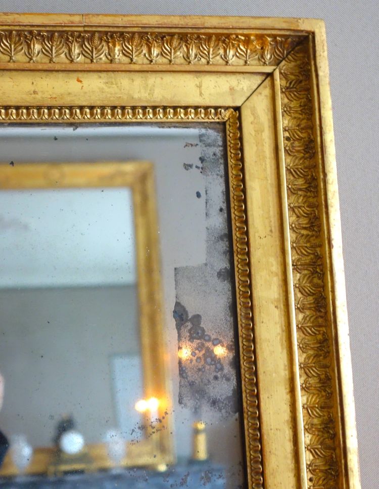 Gilt wood mirror with gold leaf and mercury glass, Empire period - 88cm x 72cm