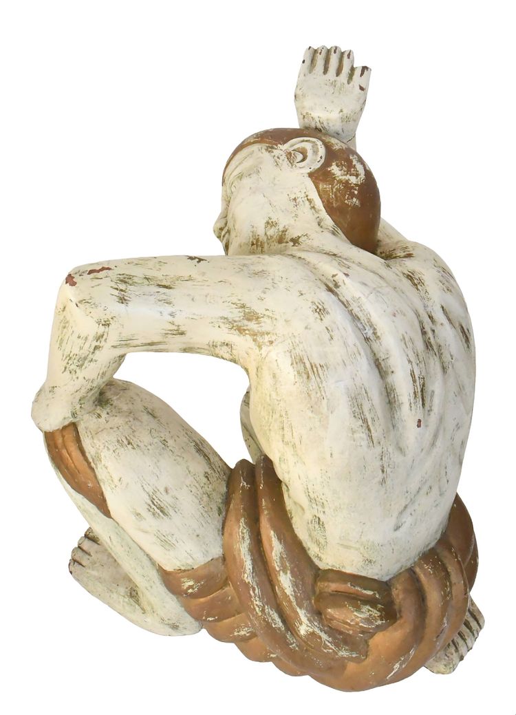 Coffee table with two figures holding a glass tray