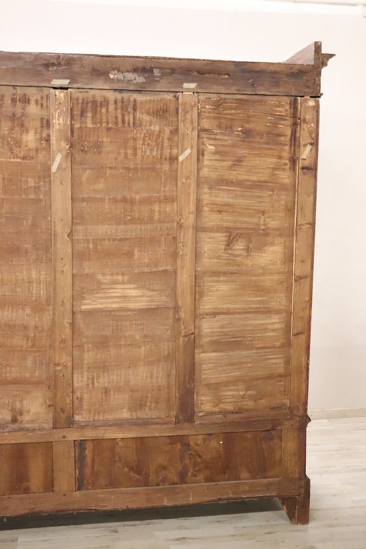 Very large 4 doors waedrobe in solid walnut, Italy Mid 19th century