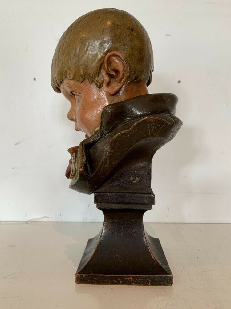 Terracotta bust depicting a young boy, 19th century