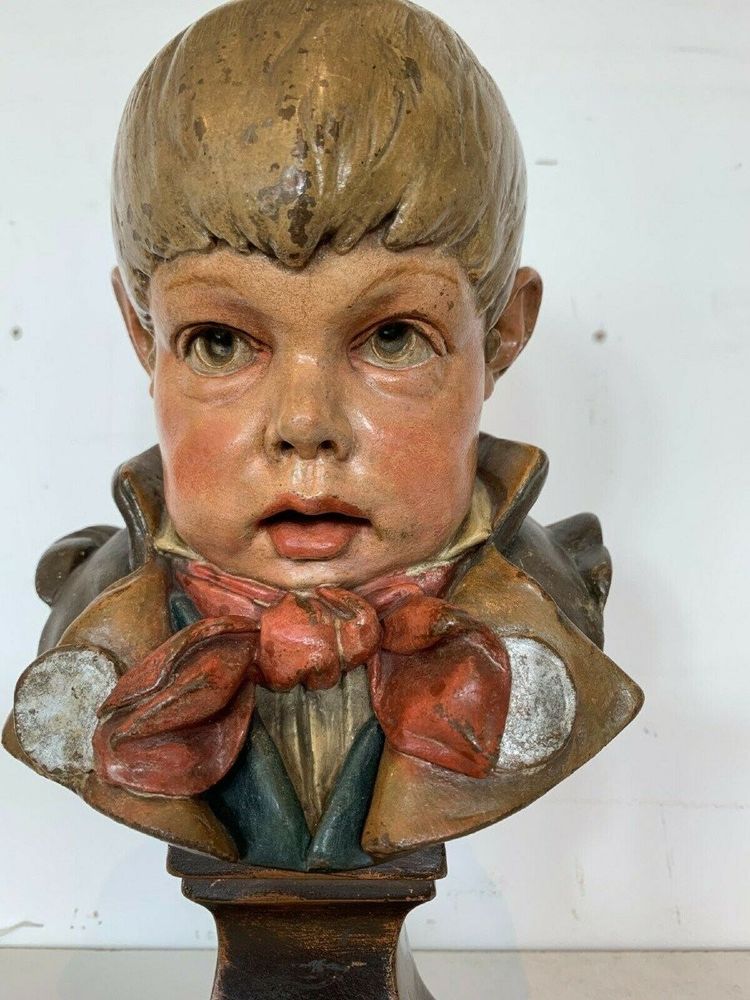 Terracotta bust depicting a young boy, 19th century