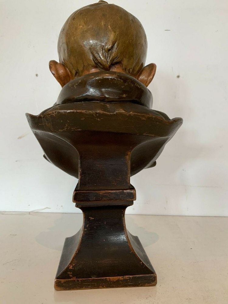 Terracotta bust depicting a young boy, 19th century