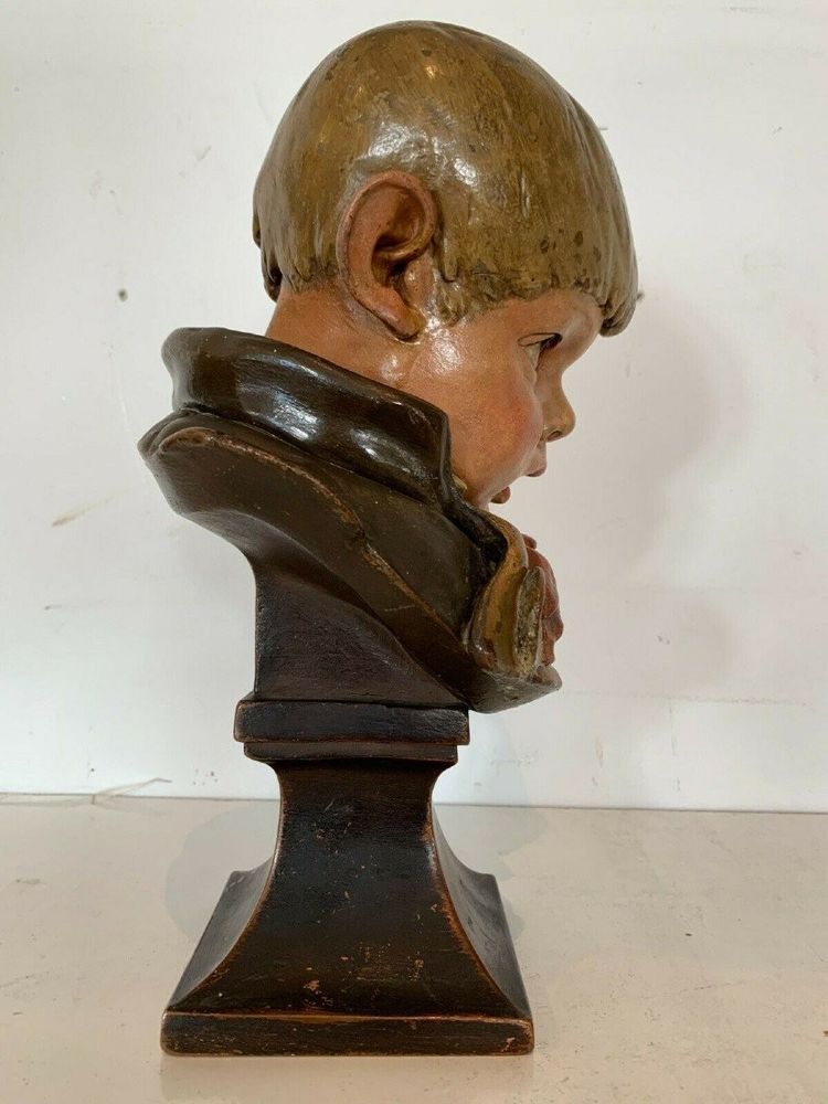 Terracotta bust depicting a young boy, 19th century