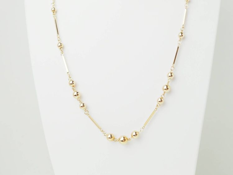 Collier boules en or rose 