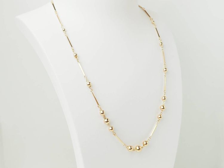 Collier boules en or rose 