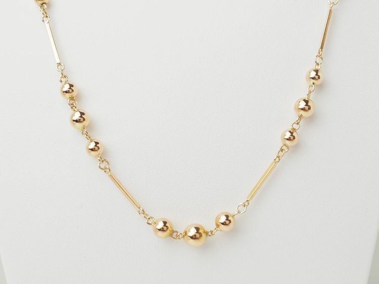 Collier boules en or rose 