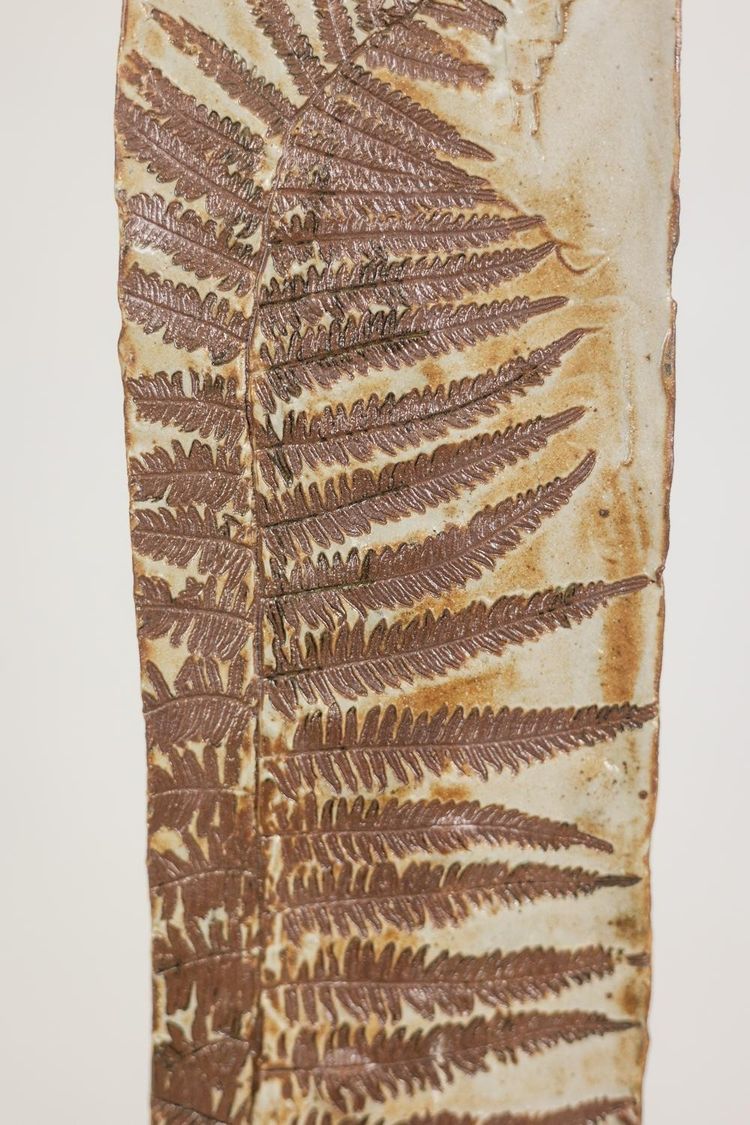 Brutalist-style stoneware vase with plant decoration. 1970s. LS6708A