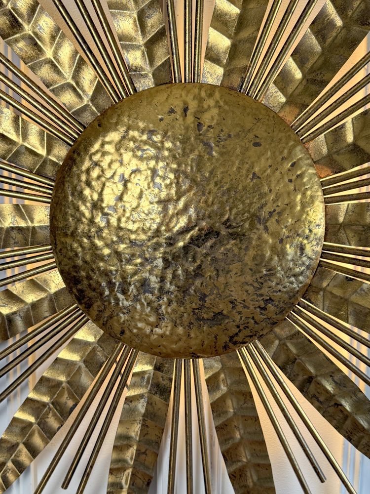 Large hammered gold metal sunburst wall light, 90 cm in diameter, from the 1970s