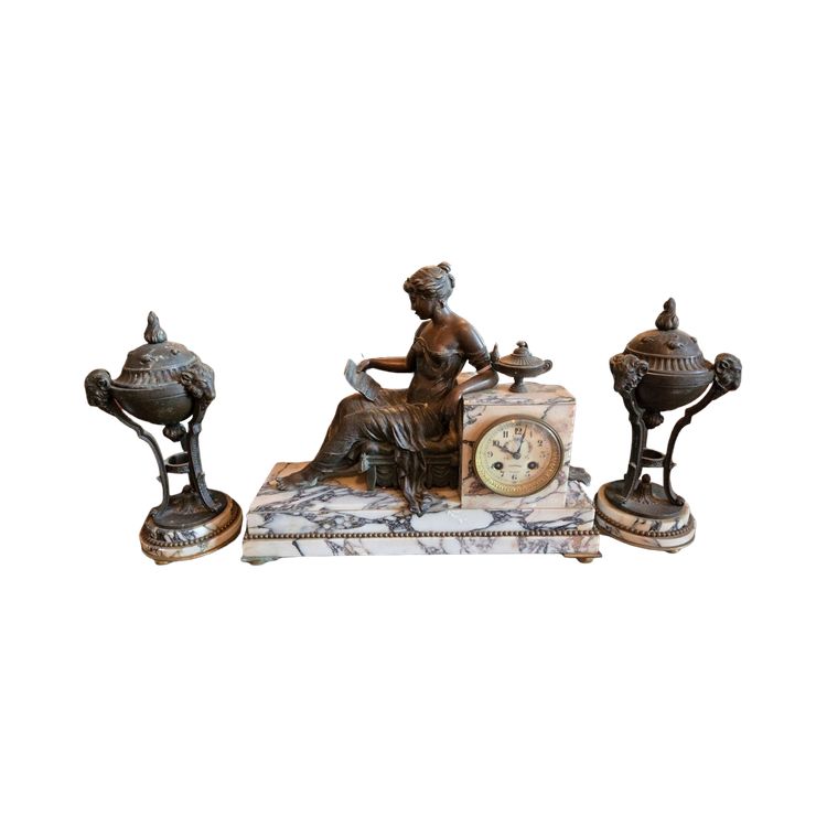 Set di tre orologi da camino in peltro – XIX secolo
