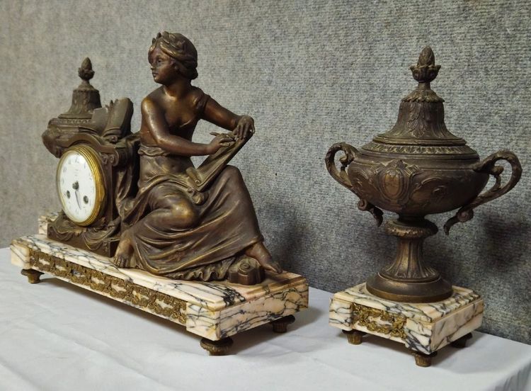 Large spelter clock set with a medal patina, Napoleon III period, circa 1880
