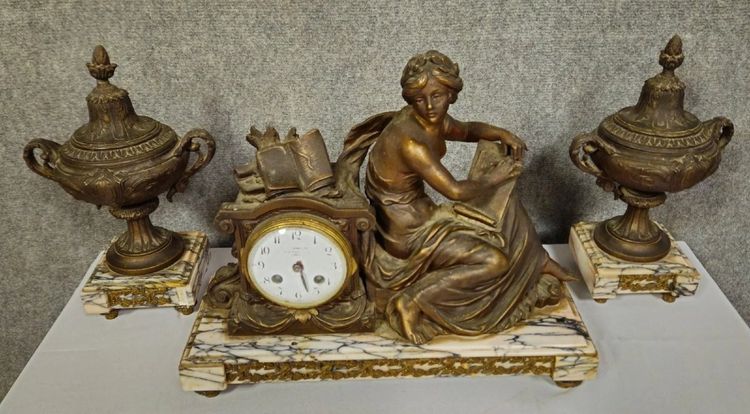 Large spelter clock set with a medal patina, Napoleon III period, circa 1880