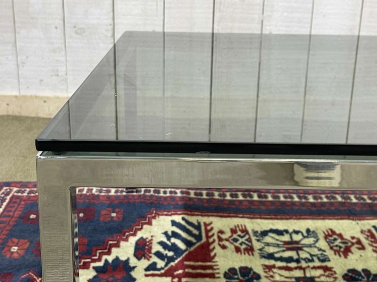 Chrome coffee table with glass top from the 1980s