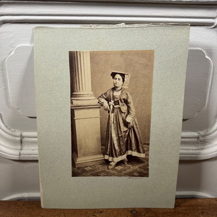 Albumen print mounted on cardboard depicting a 19th-century Italian woman