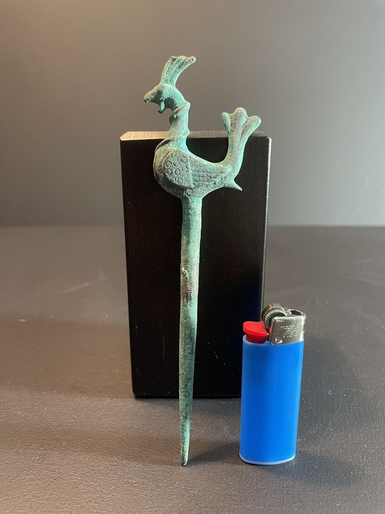 Bactria, 3rd century B.C., bronze hairpin decorated with a stylized bird.