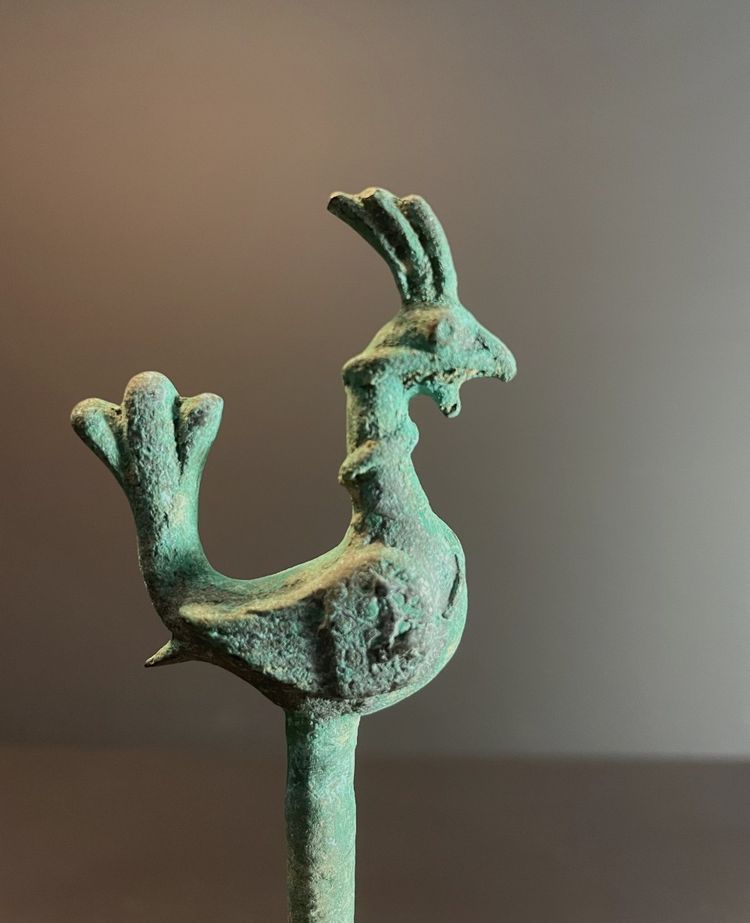 Bactria, 3rd century B.C., bronze hairpin decorated with a stylized bird.