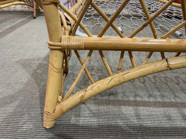 1960s rattan bed with its metal slatted base