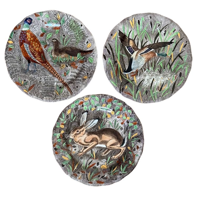 Three Gien earthenware plates, Rambouillet pattern, signed Jean Bertholle