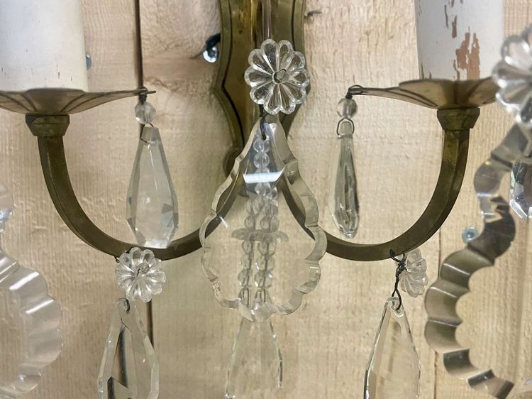 Pair of early 20th-century bronze wall sconces with crystal drops