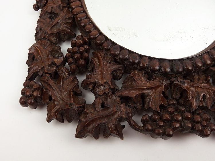 Miroir en bois sculpté