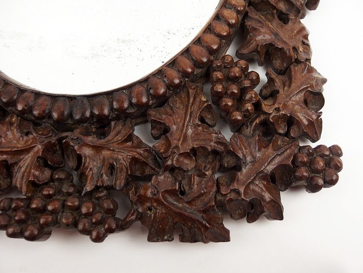 Miroir en bois sculpté