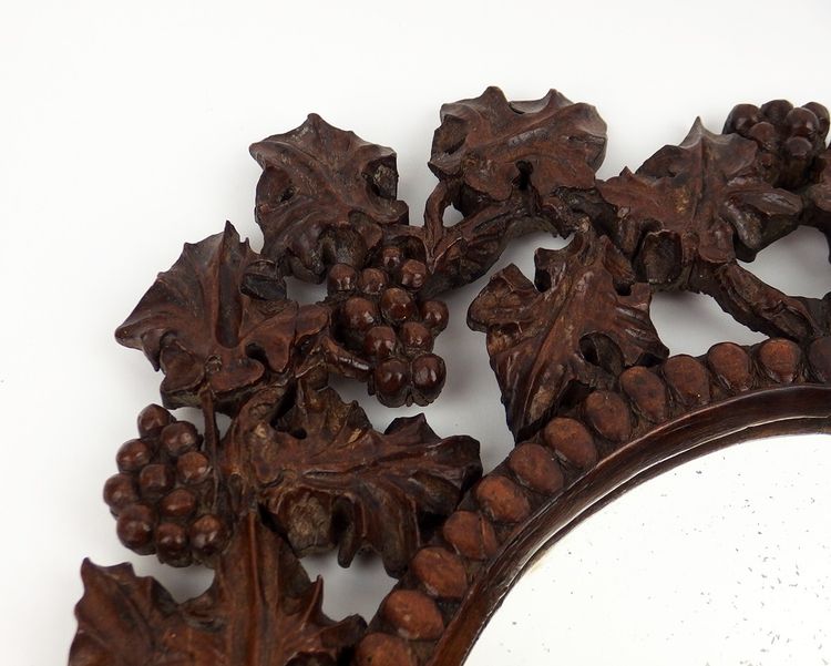 Miroir en bois sculpté