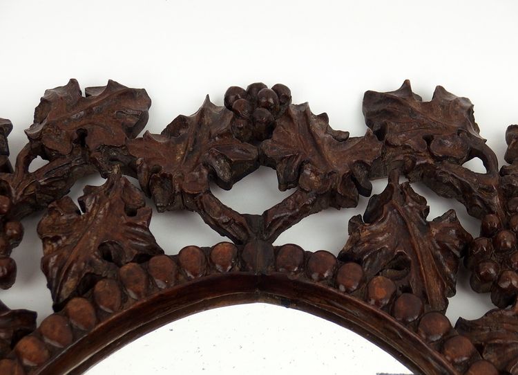 Miroir en bois sculpté
