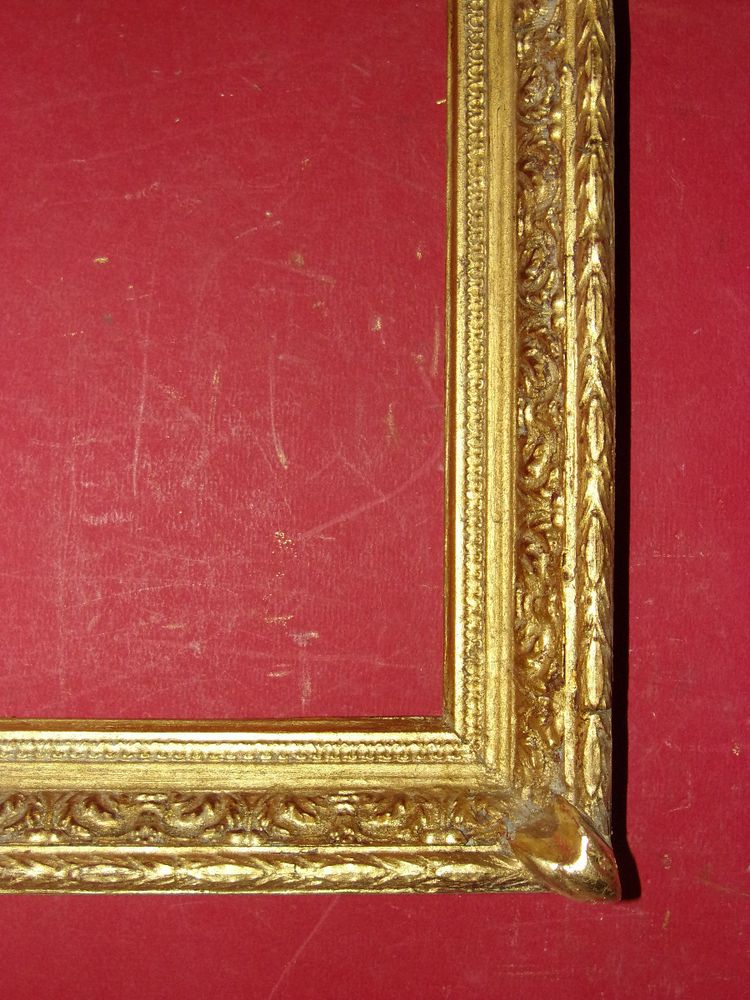 Cornice del XIX secolo in legno dorato.