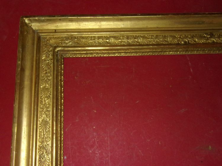 19th century Empire period frame in gilded wood.