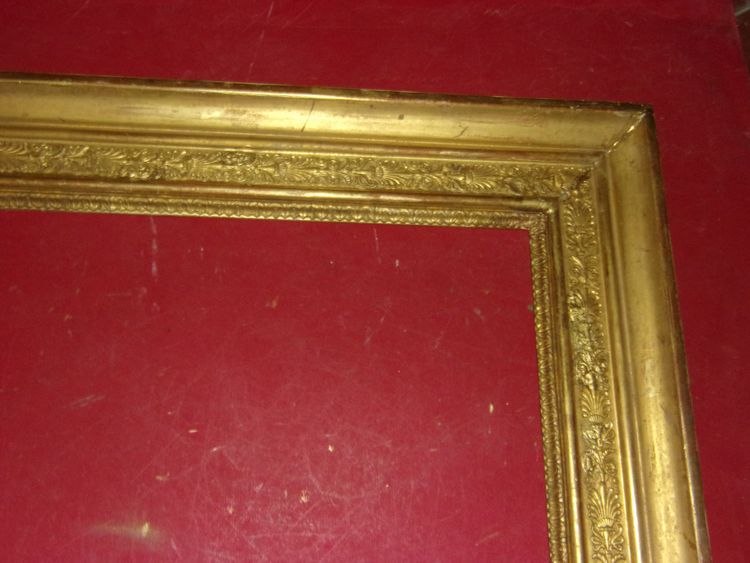 19th century Empire period frame in gilded wood.