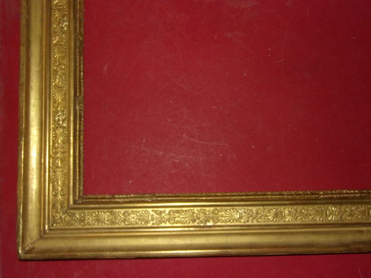 19th century Empire period frame in gilded wood.