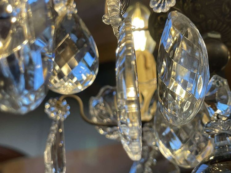 Three-light chandelier in bronze and cut crystal, early 20th century