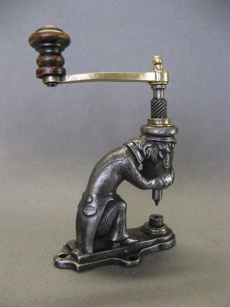 Anthropomorphic eyelet press, 19th century, circa 1800.