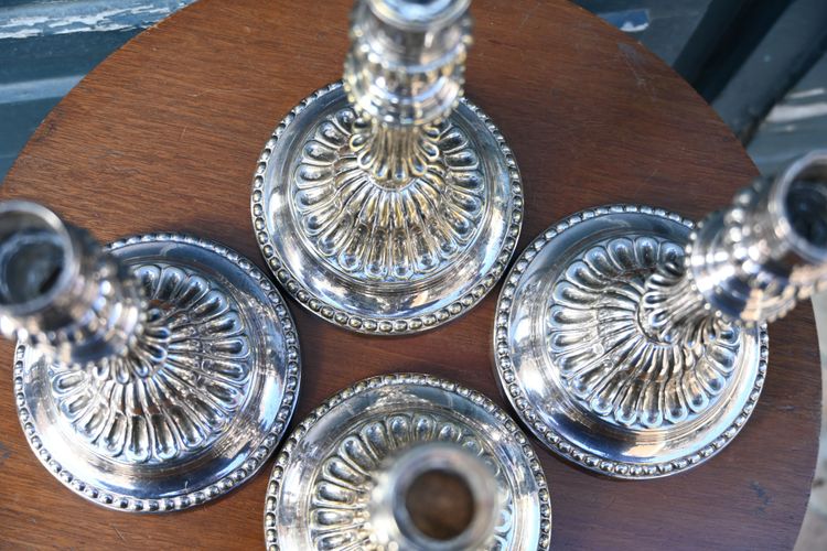 Suite of 4 Louis XVI silver-plated metal candlesticks