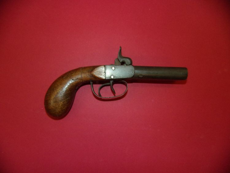 Pistolet percussion à double canon, époque 19ème.