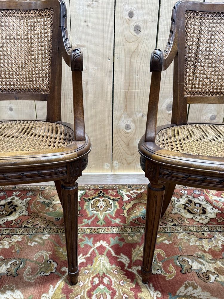 Pair of Louis XVI style caned armchairs