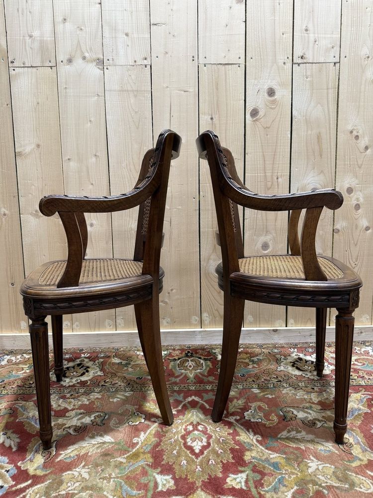 Pair of Louis XVI style caned armchairs
