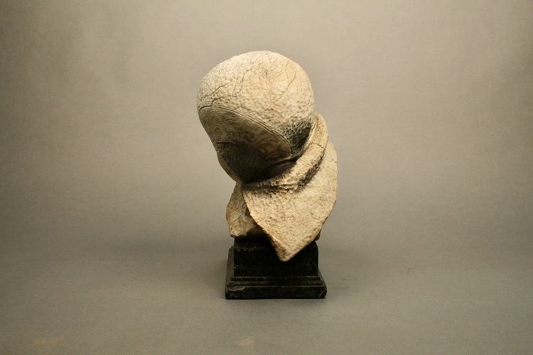 Stone sculpture Child's face 19th century on marble base