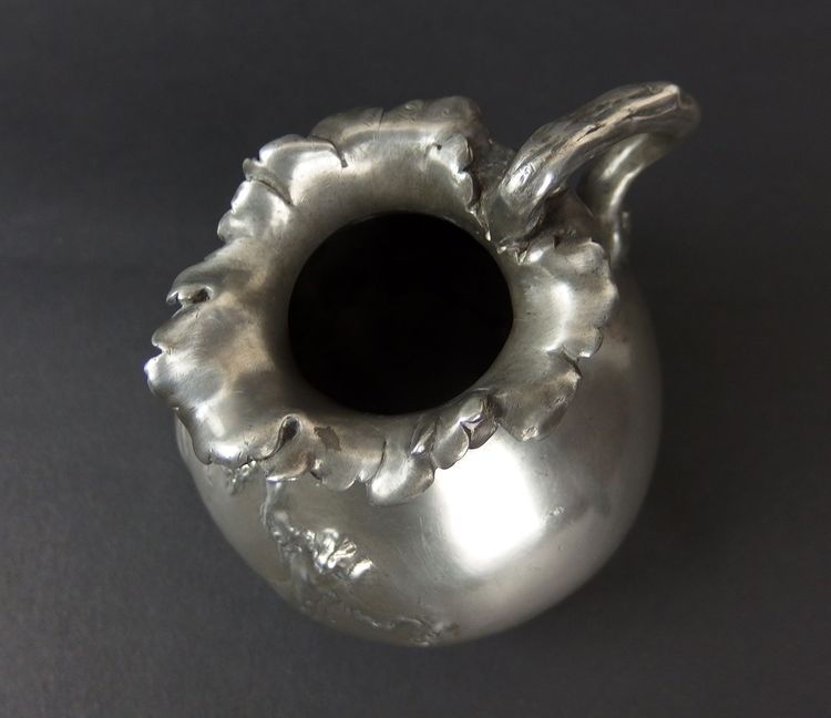 Art Nouveau spherical pewter vase by Jules Desbois